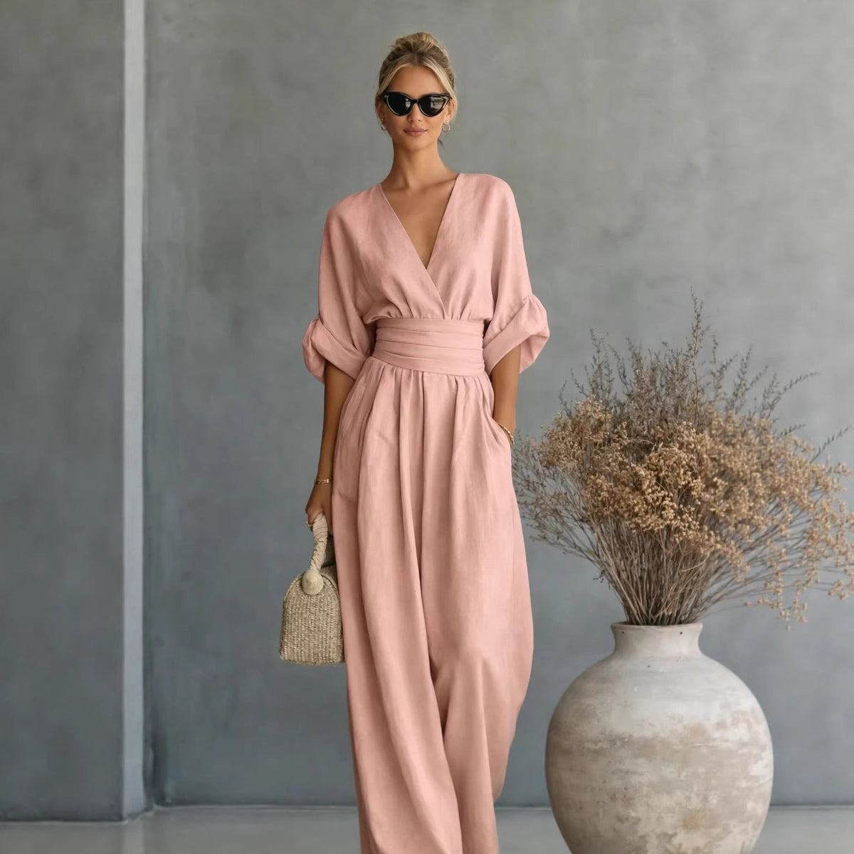 Dame Vid Jumpsuit med V-Hals og Elegant Drapering