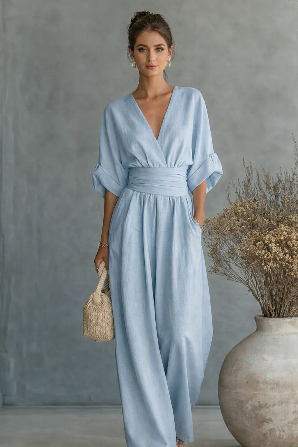 Dame Vid Jumpsuit med V-Hals og Elegant Drapering
