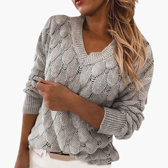 Blusa in maglia da donna con scollo a V e superficie testurizzata