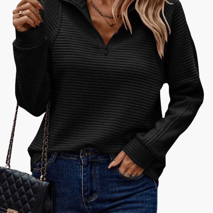 Dame sweater med lynlås og ribbet overflade
