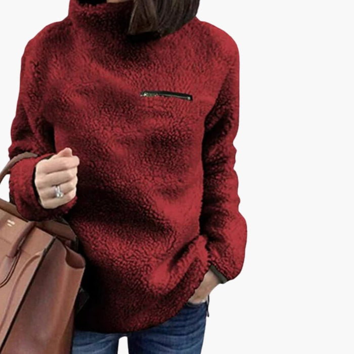 Pull en polaire à col montant pour femme avec poche zippée sur la poitrine