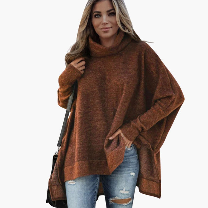 Pull poncho dame med bred krave og asymmetrisk kant