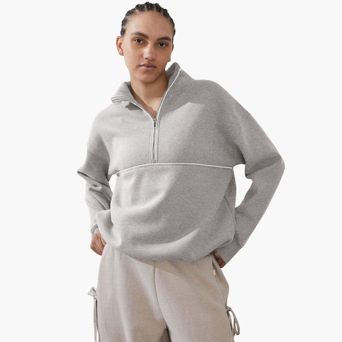 Pull de sport pour femme avec col montant et fermeture éclair