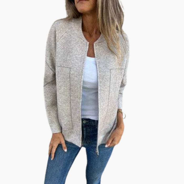 Chaqueta de mujer con cuello redondo y bolsillos laterales