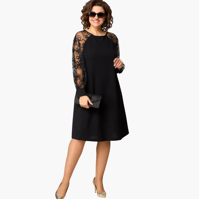 Abito da donna con maniche in pizzo e scollo rotondo