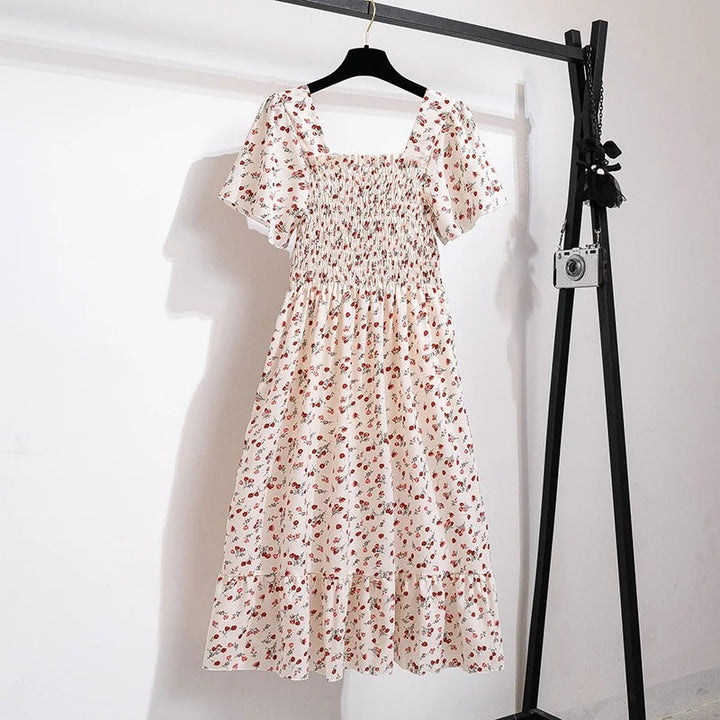 Kvinnenes Elegante Blomstrete Midikjole – Perfekt for Sommeren