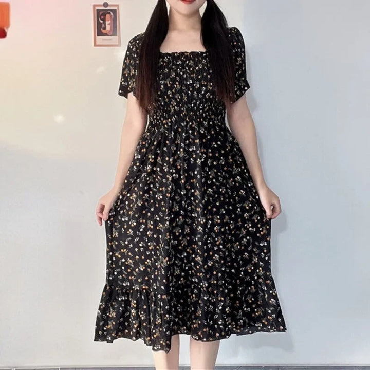 Kvinnenes Elegante Blomstrete Midikjole – Perfekt for Sommeren