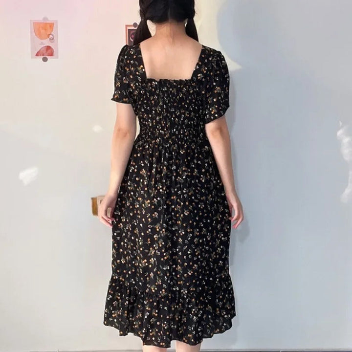 Kvinnenes Elegante Blomstrete Midikjole – Perfekt for Sommeren