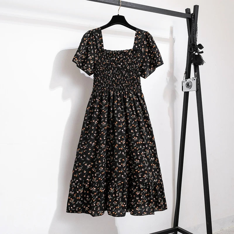 Kvinnenes Elegante Blomstrete Midikjole – Perfekt for Sommeren