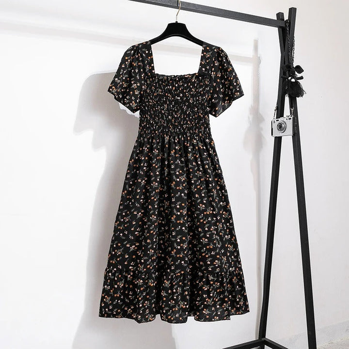 Kvinnenes Elegante Blomstrete Midikjole – Perfekt for Sommeren