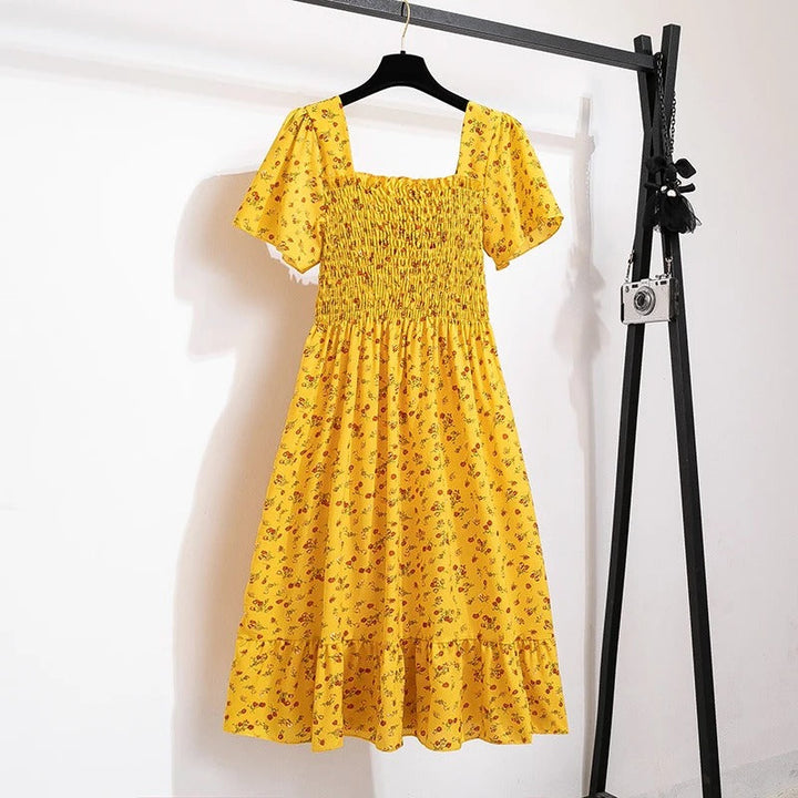 Kvinnenes Elegante Blomstrete Midikjole – Perfekt for Sommeren