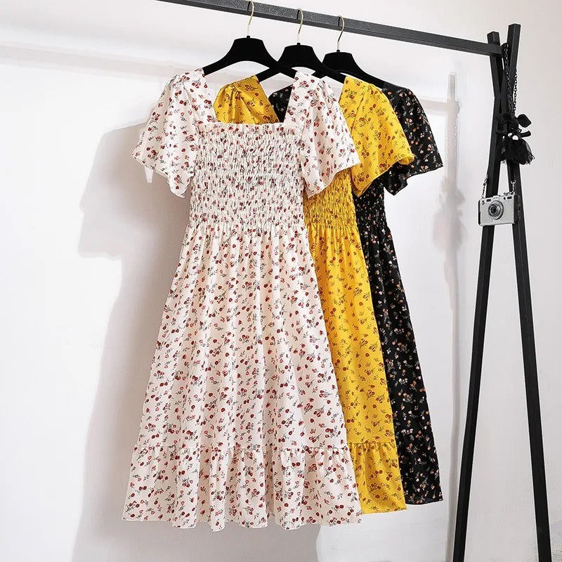 Kvinnenes Elegante Blomstrete Midikjole – Perfekt for Sommeren