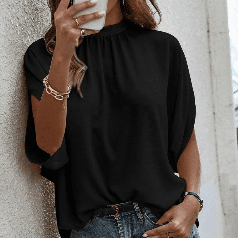 Damebluse med Halvlange Ermer og Elegante Splittdetaljer