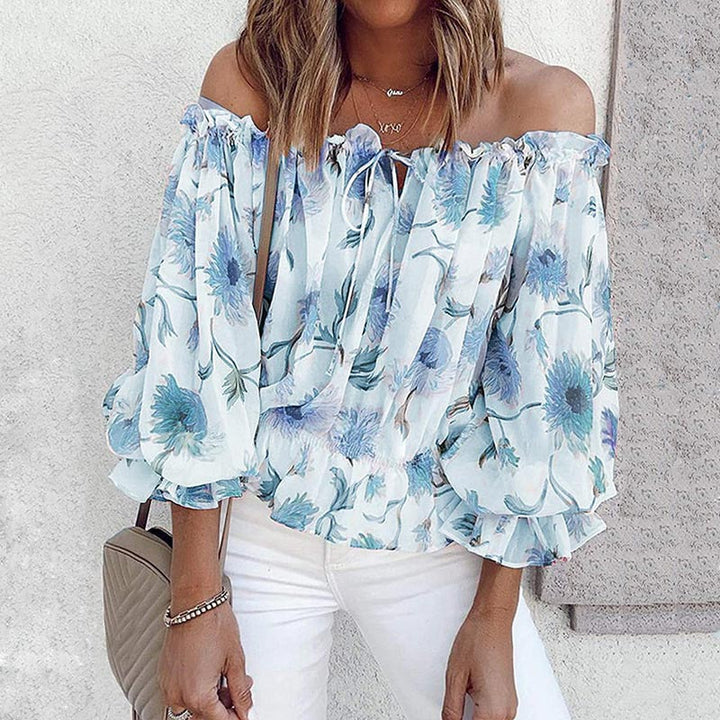 Stilig Dame Blomstret Bluse med Volanger og Off-Shoulder